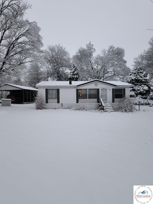 view of front of house with a carport