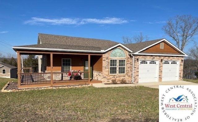 single story home featuring covered porch, driveway, a front lawn, and an attached garage