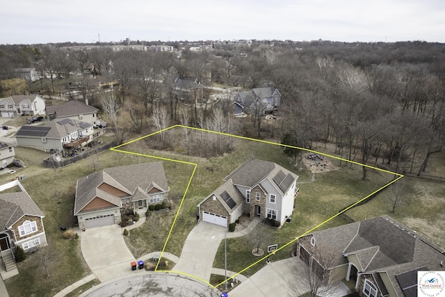 birds eye view of property with a residential view