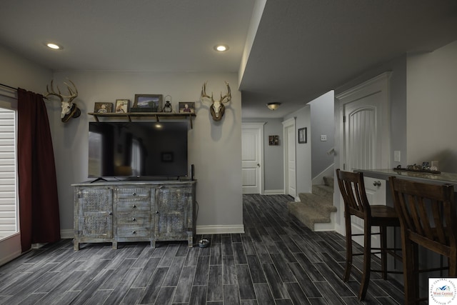 interior space featuring stairs, recessed lighting, baseboards, and wood tiled floor