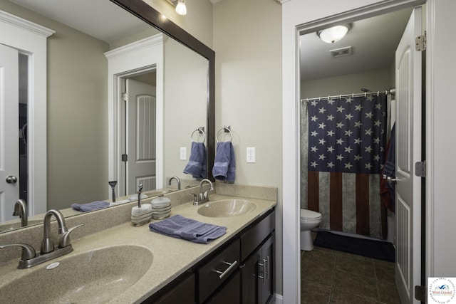 bathroom with tile patterned floors, visible vents, toilet, and a sink