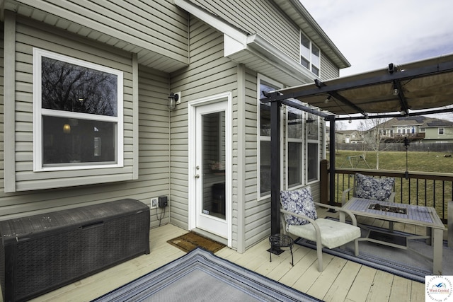 wooden terrace featuring a sunroom