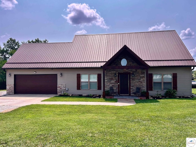 view of front of home with driveway, metal roof, stone siding, and a front lawn