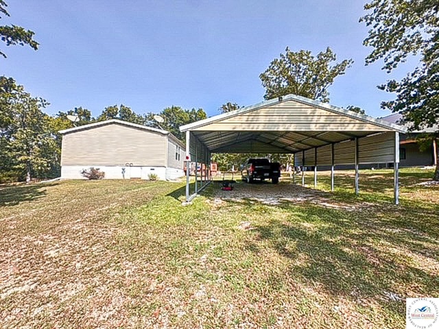 exterior space with a carport