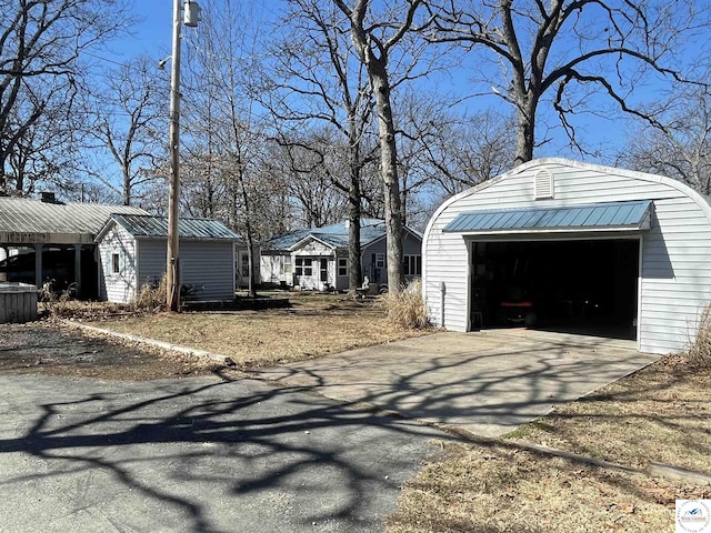 exterior space featuring driveway