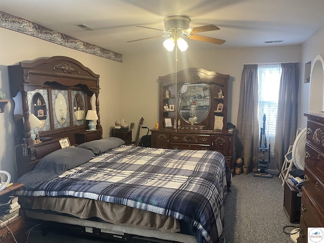 bedroom featuring carpet flooring, visible vents, and ceiling fan