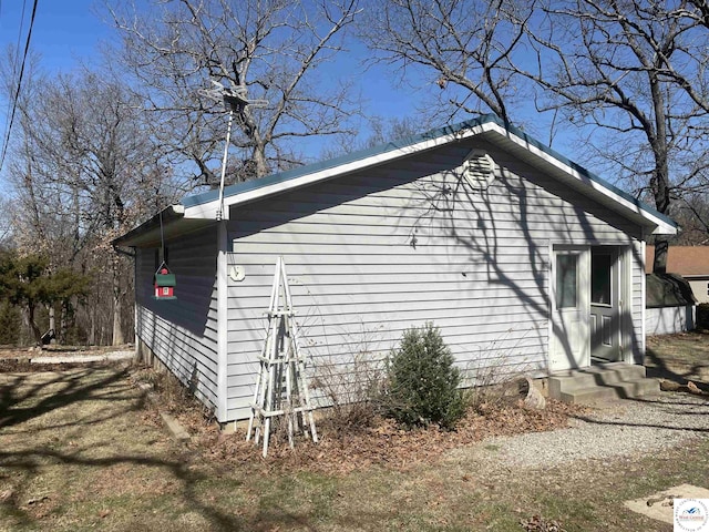 view of property exterior with entry steps