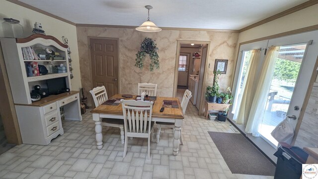 dining area with ornamental molding and brick floor