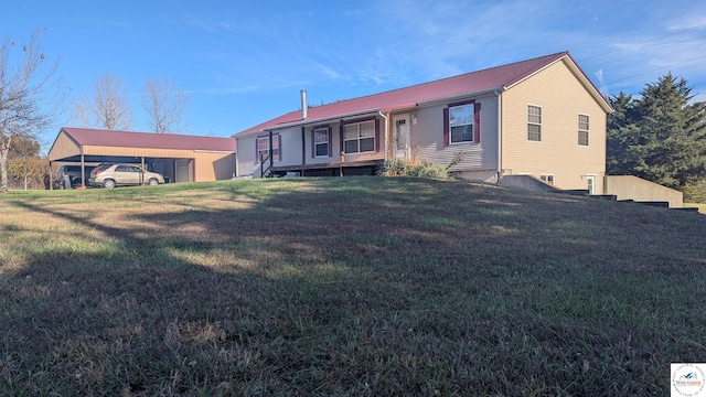 view of front facade with covered porch and a front lawn