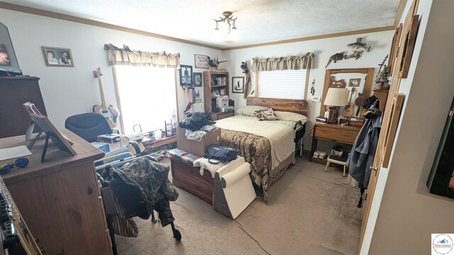 bedroom featuring crown molding and light colored carpet