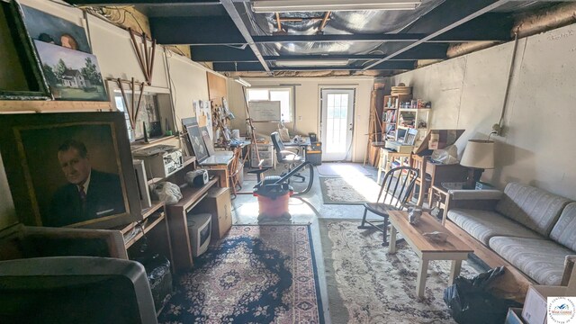 living room with concrete flooring