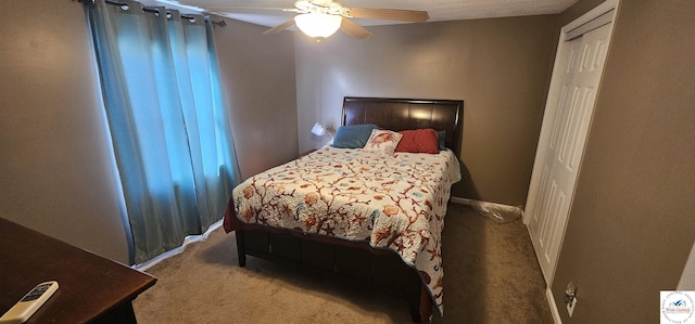 carpeted bedroom featuring a ceiling fan