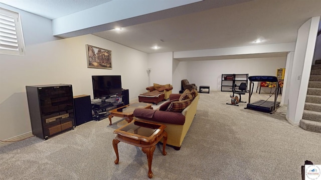 carpeted living room featuring stairs, baseboards, and recessed lighting