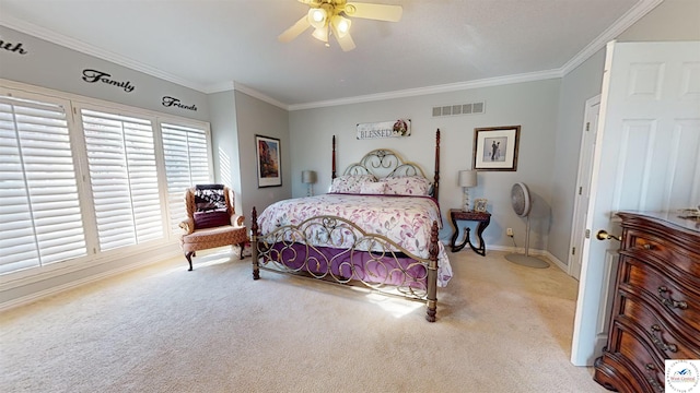 bedroom with ceiling fan, light carpet, visible vents, baseboards, and ornamental molding