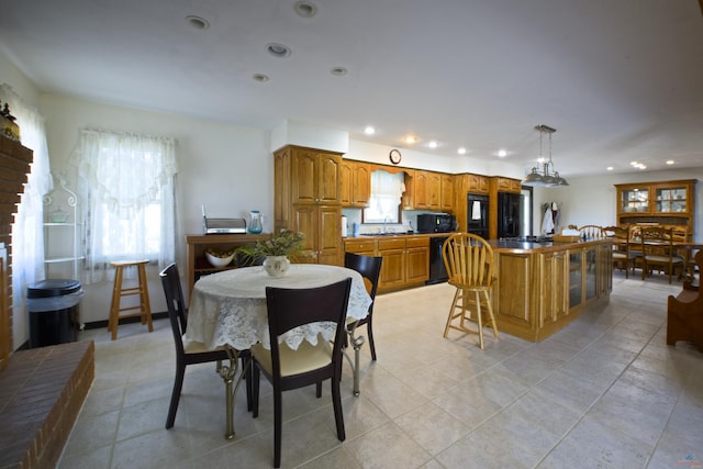 dining room featuring light tile patterned floors and recessed lighting