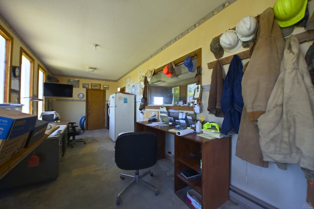 office space with concrete floors