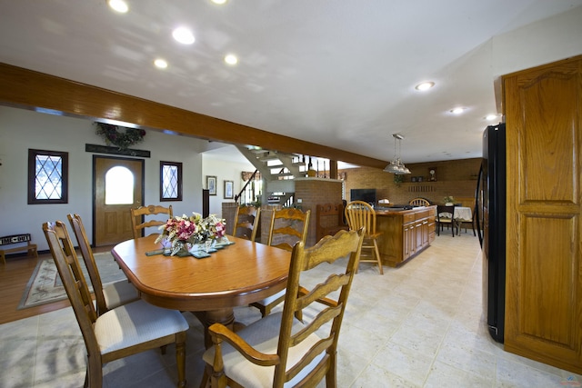 dining space with stairway and recessed lighting