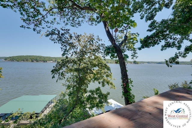 property view of water with a boat dock