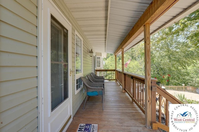 wooden terrace with covered porch