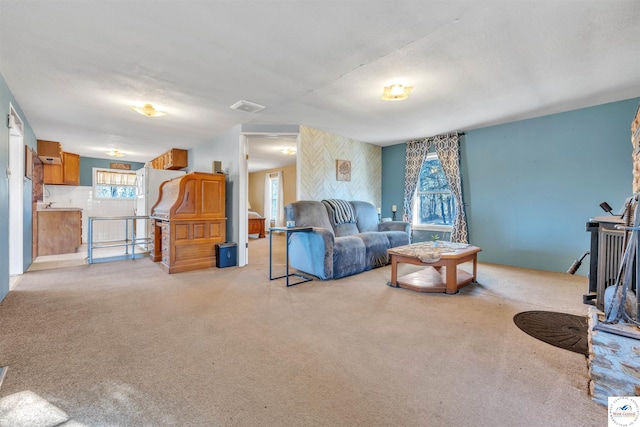 living room featuring visible vents