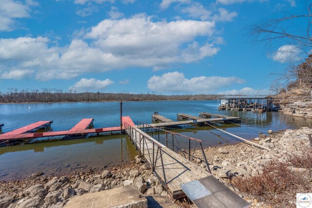 view of dock with a water view