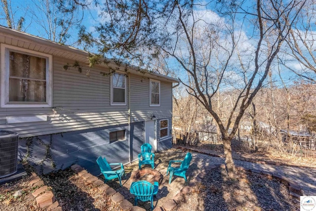 back of property with central air condition unit