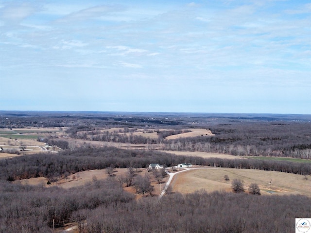 birds eye view of property featuring a rural view