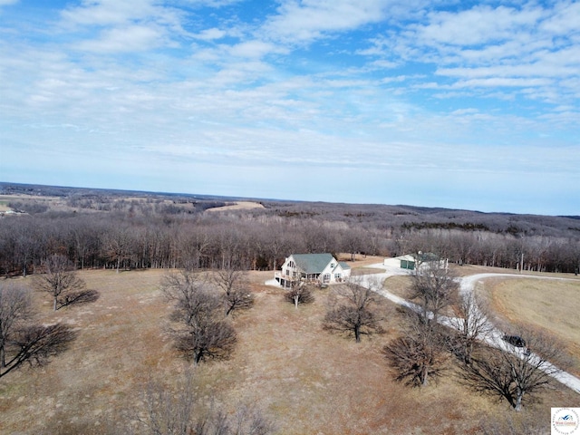 birds eye view of property with a rural view