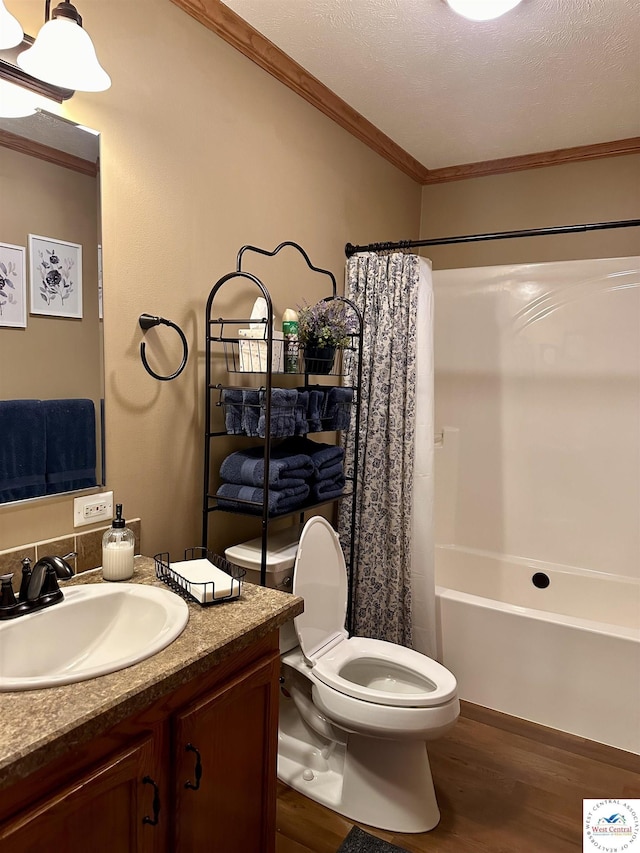 full bathroom featuring toilet, shower / bath combo with shower curtain, ornamental molding, vanity, and wood finished floors