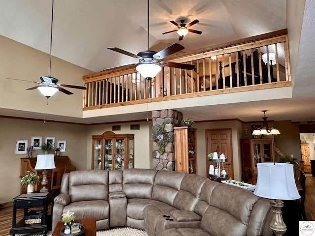 living area featuring high vaulted ceiling, wood finished floors, and a ceiling fan