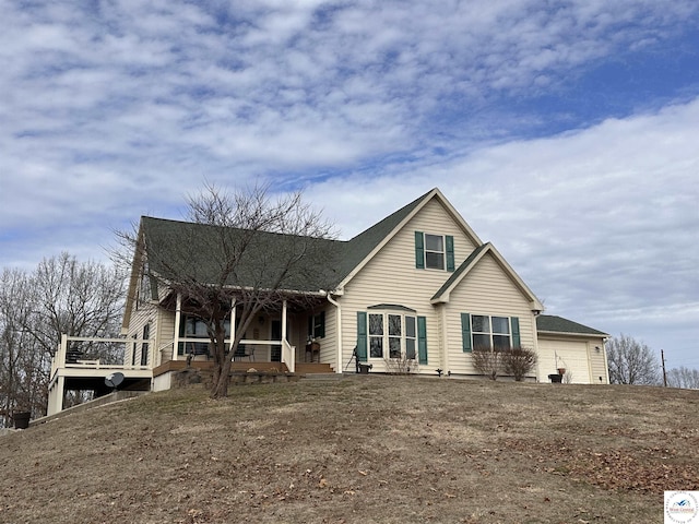 view of front of property featuring an attached garage