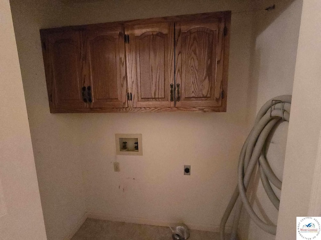 laundry room featuring baseboards, washer hookup, cabinet space, and electric dryer hookup