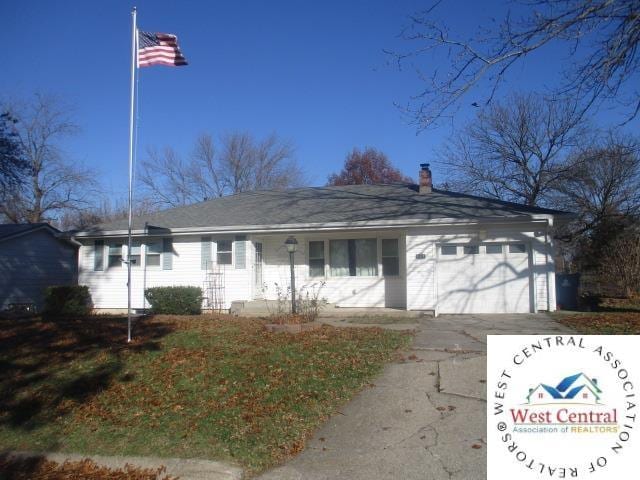 ranch-style house featuring driveway and an attached garage