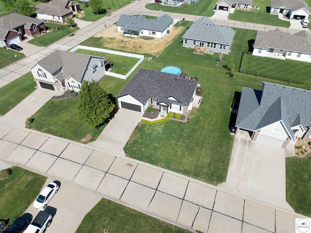 drone / aerial view with a residential view