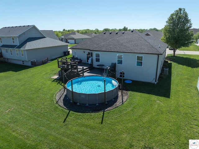 outdoor pool with a lawn