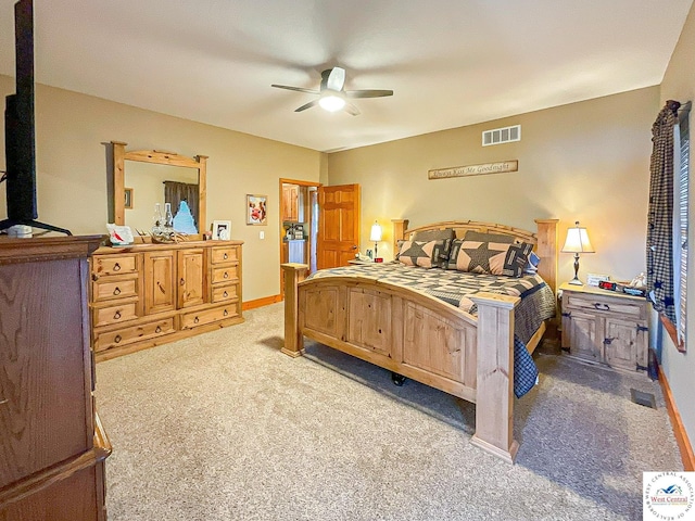 bedroom featuring light carpet, baseboards, visible vents, and a ceiling fan