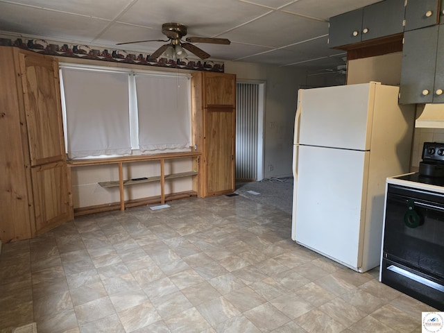 kitchen featuring a ceiling fan, freestanding refrigerator, black electric range, and custom range hood