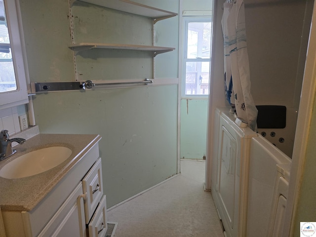 full bathroom with curtained shower, vanity, and a tub