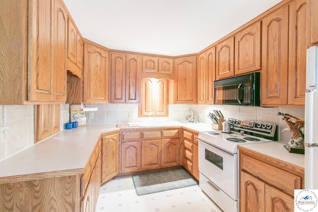 kitchen featuring tasteful backsplash, white appliances, light countertops, and light floors