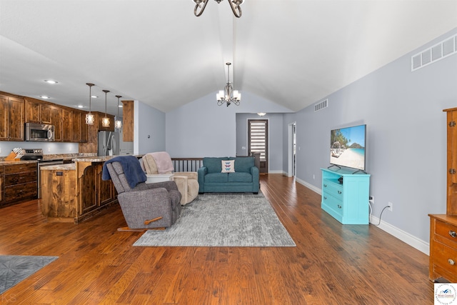 living room with lofted ceiling, dark wood-style flooring, and visible vents