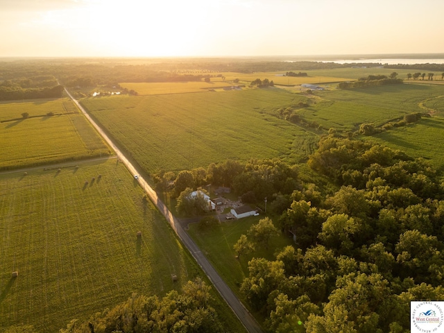 birds eye view of property with a rural view