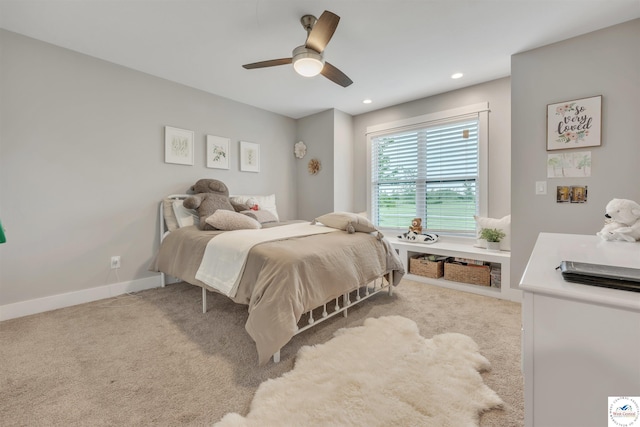 bedroom with light carpet, baseboards, a ceiling fan, and recessed lighting