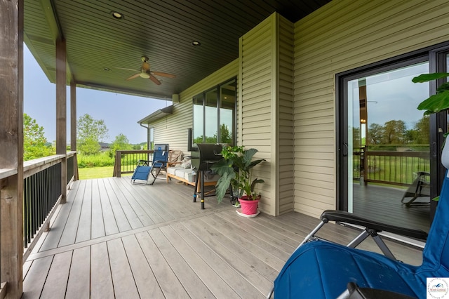 wooden terrace with ceiling fan