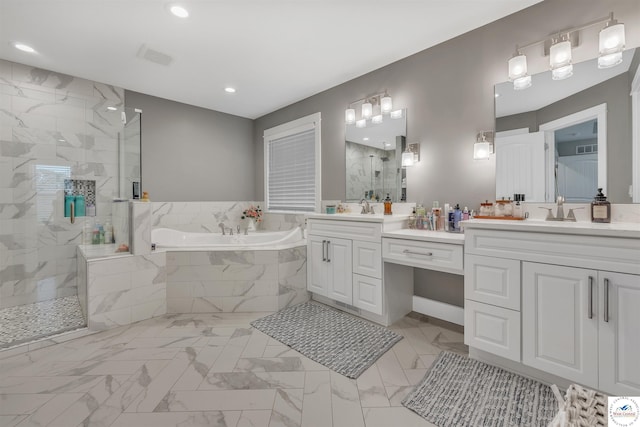 bathroom featuring a tile shower, double vanity, a sink, and a bath