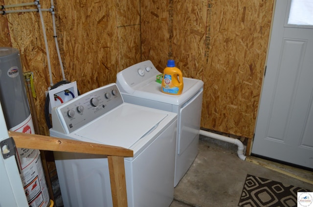 laundry area featuring laundry area, washer and clothes dryer, and gas water heater