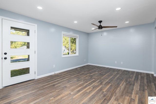 unfurnished room featuring baseboards, dark wood finished floors, a ceiling fan, and recessed lighting