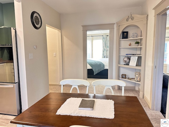 dining space with built in shelves