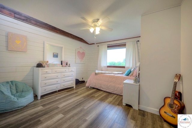 bedroom with a ceiling fan and wood finished floors