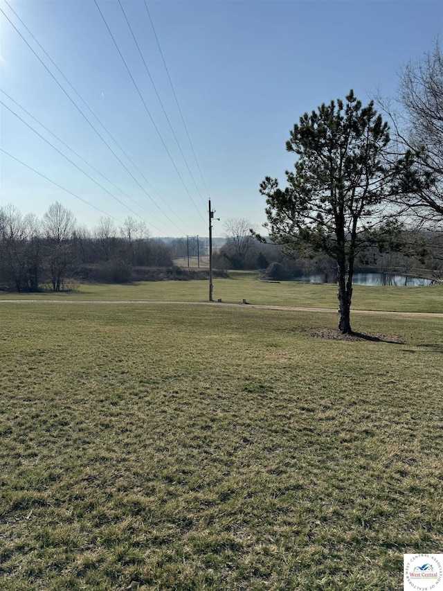 view of yard featuring a water view