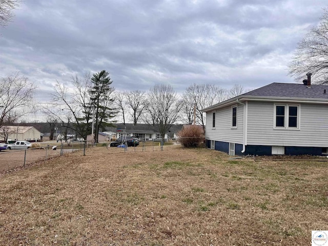 view of yard with fence